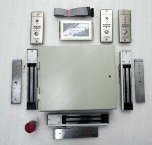 Advanced air shower control system 3d 600hd, electromagnetic locks, emergency switches, and control unit for cleanroom access control.